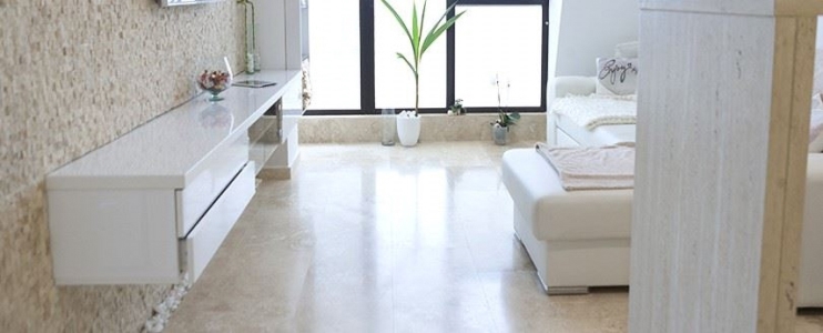 A bright living room home-made with travertine